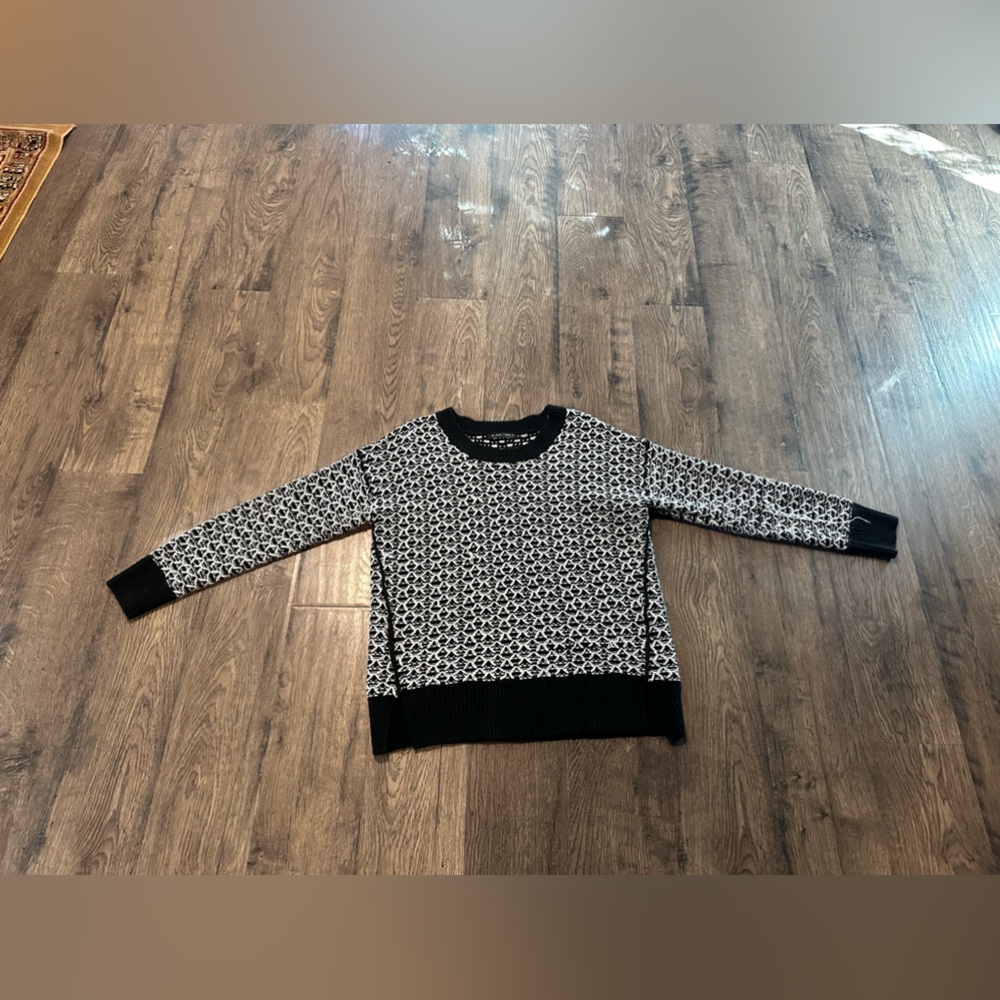 Women's size large, Black Tape brand, white and black sweater.